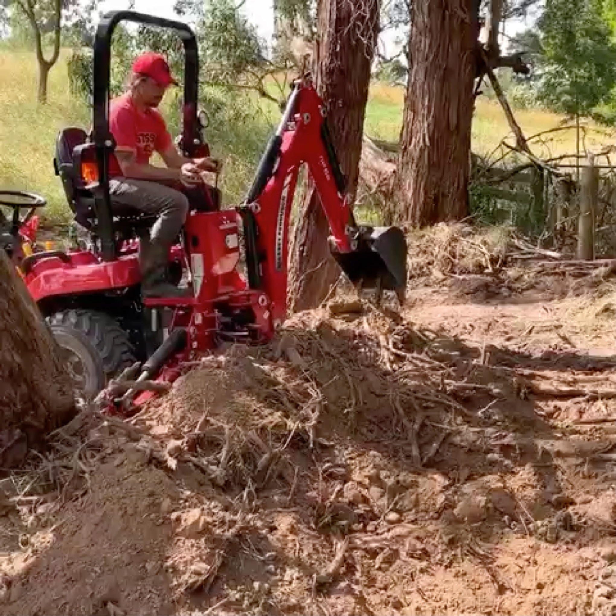 Evan operating excavator for land clearing and property maintenance