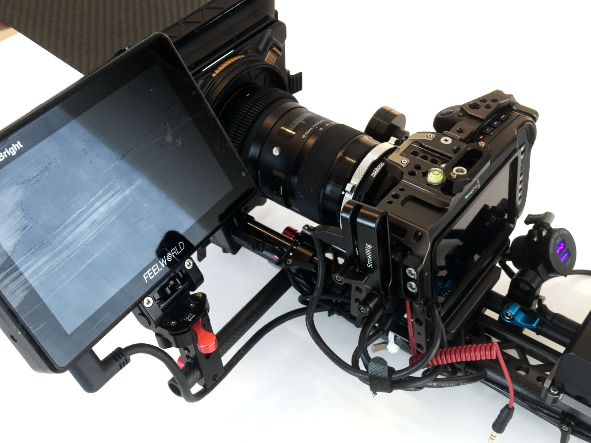 Professional Blackmagic Pocket Cinema Camera 4K setup with external monitor and rig